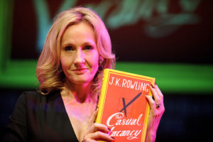 JK Rowling proudly holds copy of "The Casual Vacancy"