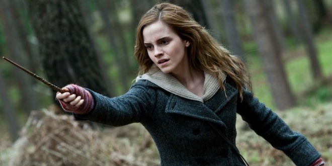Hermione in a forest point her wand