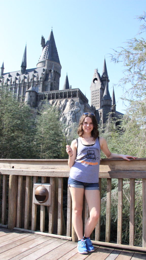 A picture of Amy standing in front of the Hogwarts Castle