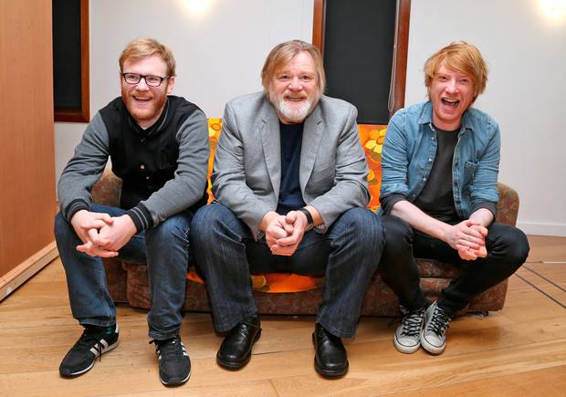 Domhnall Gleeson, far right, is pictured with father Brendan Gleeson and brother Brian Gleeson.