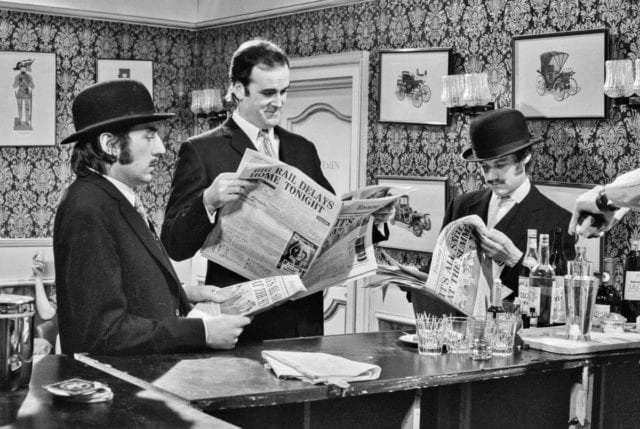 John Cleese, center. is pictured in a still from a "Monty Python's Flying Circus" sketch.