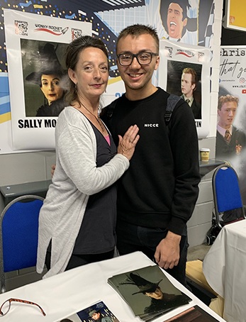 Sally Mortemore poses with a fan at Preston Comic Con.