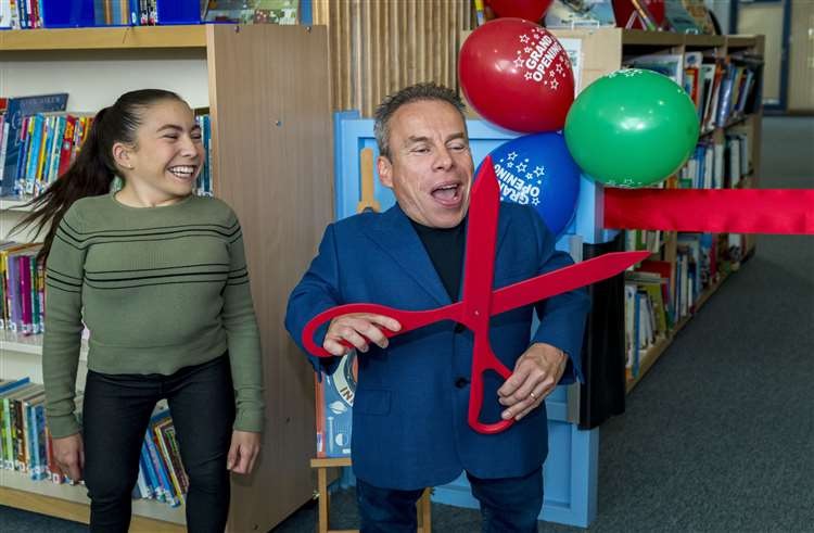 Warwick Davis and daughter Annabelle open a new school extension in Cambridge, England.