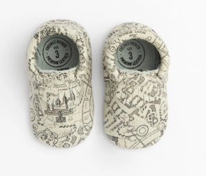 pair of baby shoes printed with marauders map design