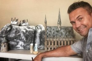Tony Rigby featured with a miniature version of Hogwarts he built himself.