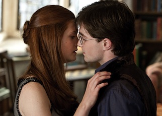 Ginny and Harry kiss.