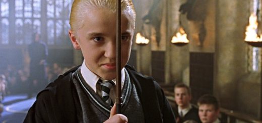 Draco Malfoy is shown with his wand raised during Dueling Club in the film adaptation of "Chamber of Secrets."