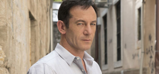 Jason Isaacs looks smoulderingly into the camera.