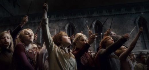 Lynch as Luna Lovegood (left), raising her wand alongside fellow Hogwarts students and staff after Dumbledore's death in "Harry Potter and the Half-Blood Prince"