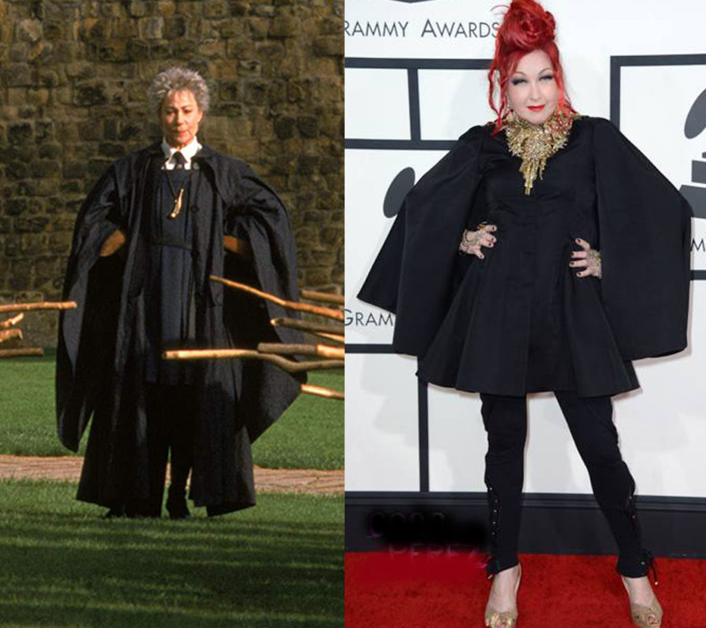 madam hooch and cyndi lauper in similar-looking flowing black draped dresses/robes