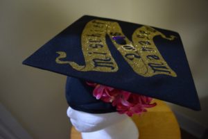 Additional decorations like flowers and ribbons for the diy Potter graduation cap