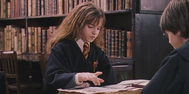 Hermione reading about Nicolas Flamel