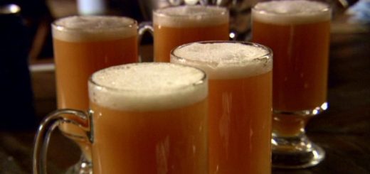 Five glasses of homemade Butterbeer.