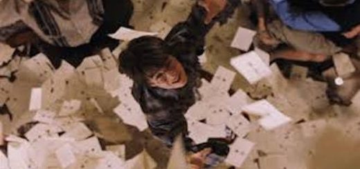 Harry Potter trying to catch Hogwarts letters out of the air