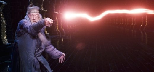 Albus Dumbledore is shown with a jet of red light coming from his wand.