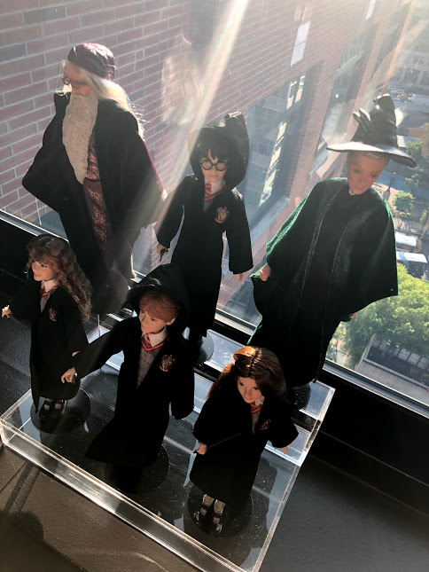 Realistic “Potter” Barbie dolls, including Albus Dumbledore, Harry Potter, Minerva McGonagall, Hermione Granger, Ron Weasley, and Ginny Weasley