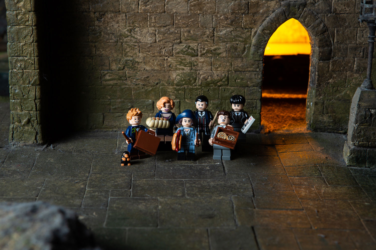 Credence, Graves, Jacob, Newt, Queenie, and Tina represent “Fantastic Beasts” in the new LEGO minifigures wizarding world series.