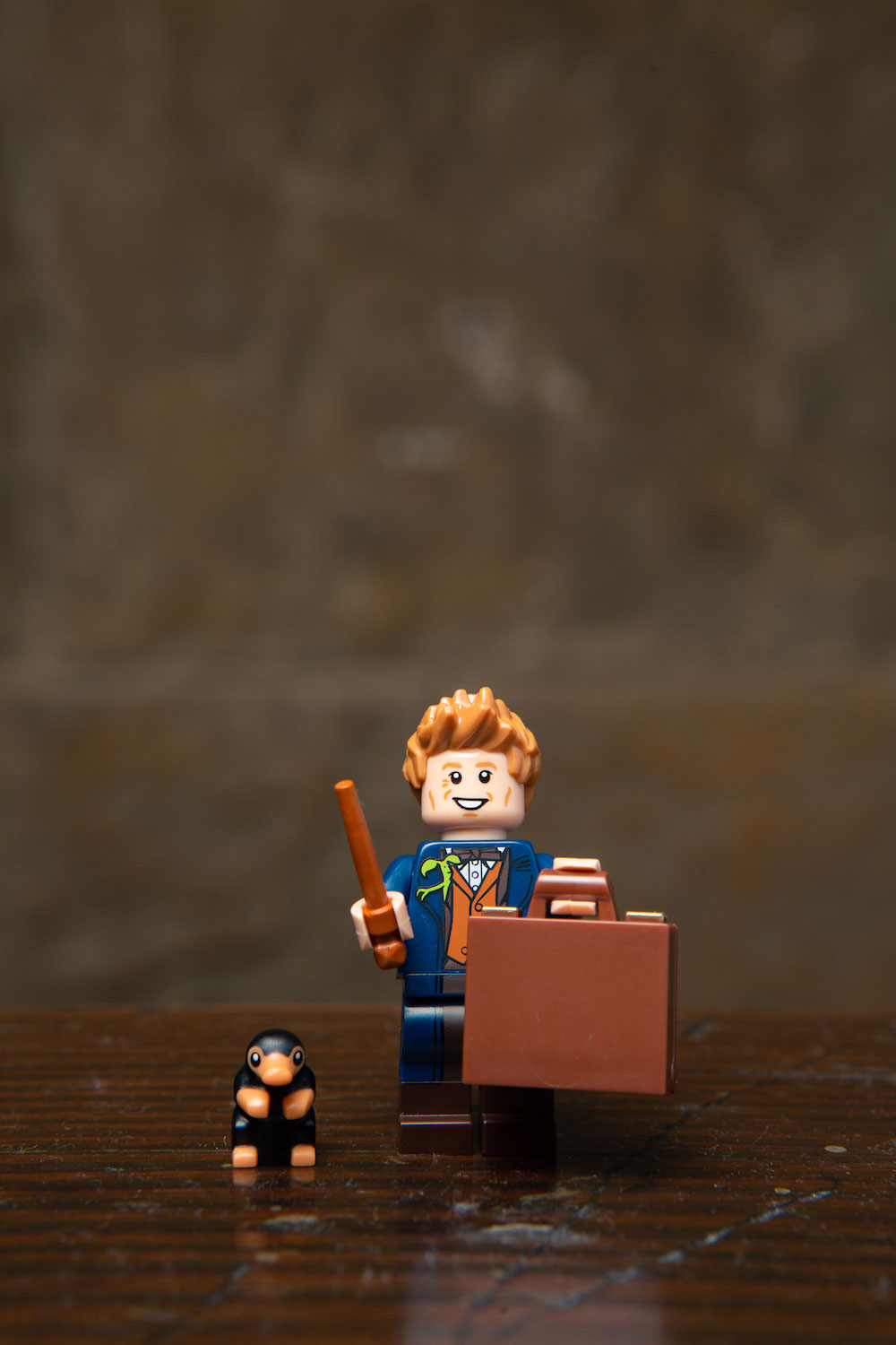 Newt’s LEGO minifigure includes his iconic briefcase and his troublesome Niffler friend. ;)