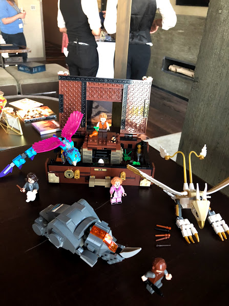 An Erumpent, a Thunderbird, and an Occamy clamber out of Newt’s suitcase in this new LEGO set, which includes Jacob, Queenie, Newt, and Tina LEGOs.