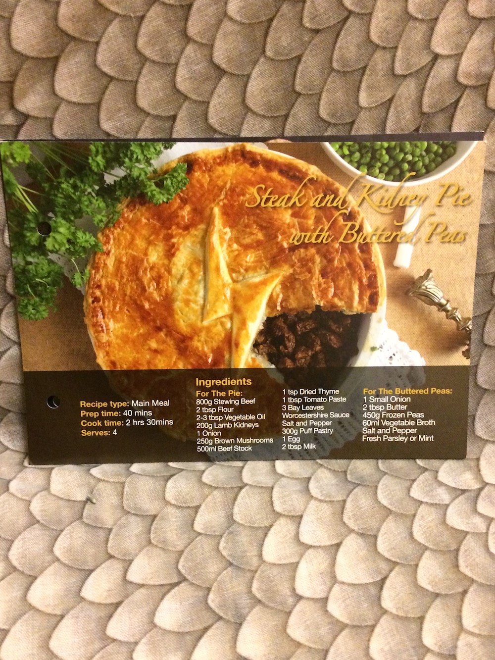 This recipe card gives instructions on how to make a steak and kidney pie, a British classic.