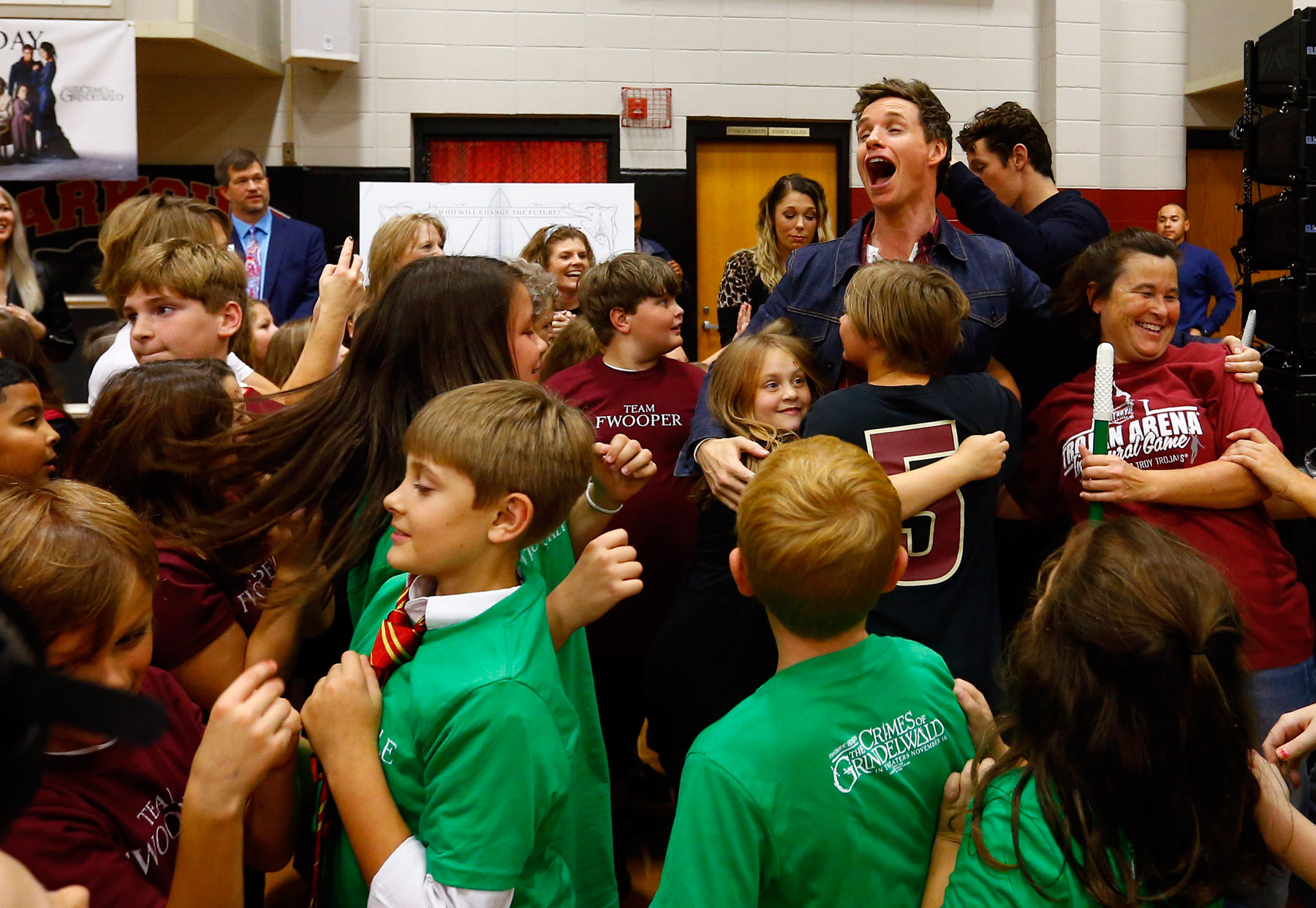 Cast members from “Fantastic Beasts: The Crimes of Grindelwald” celebrate Wizarding World Day at Parkside Middle School in Baileyton, AL.(Photo by Butch Dill/Getty Images)