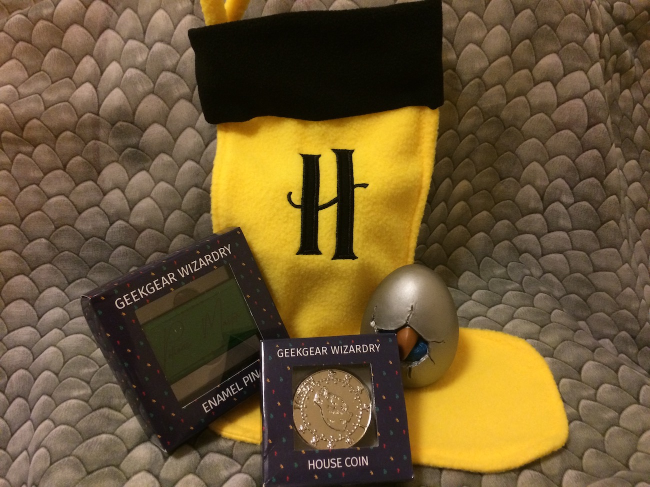 Also included in this month’s box were a Hogwarts House stocking, an enamel pin badge, a limited-edition wizardry coin, and a collectible magical creature egg.