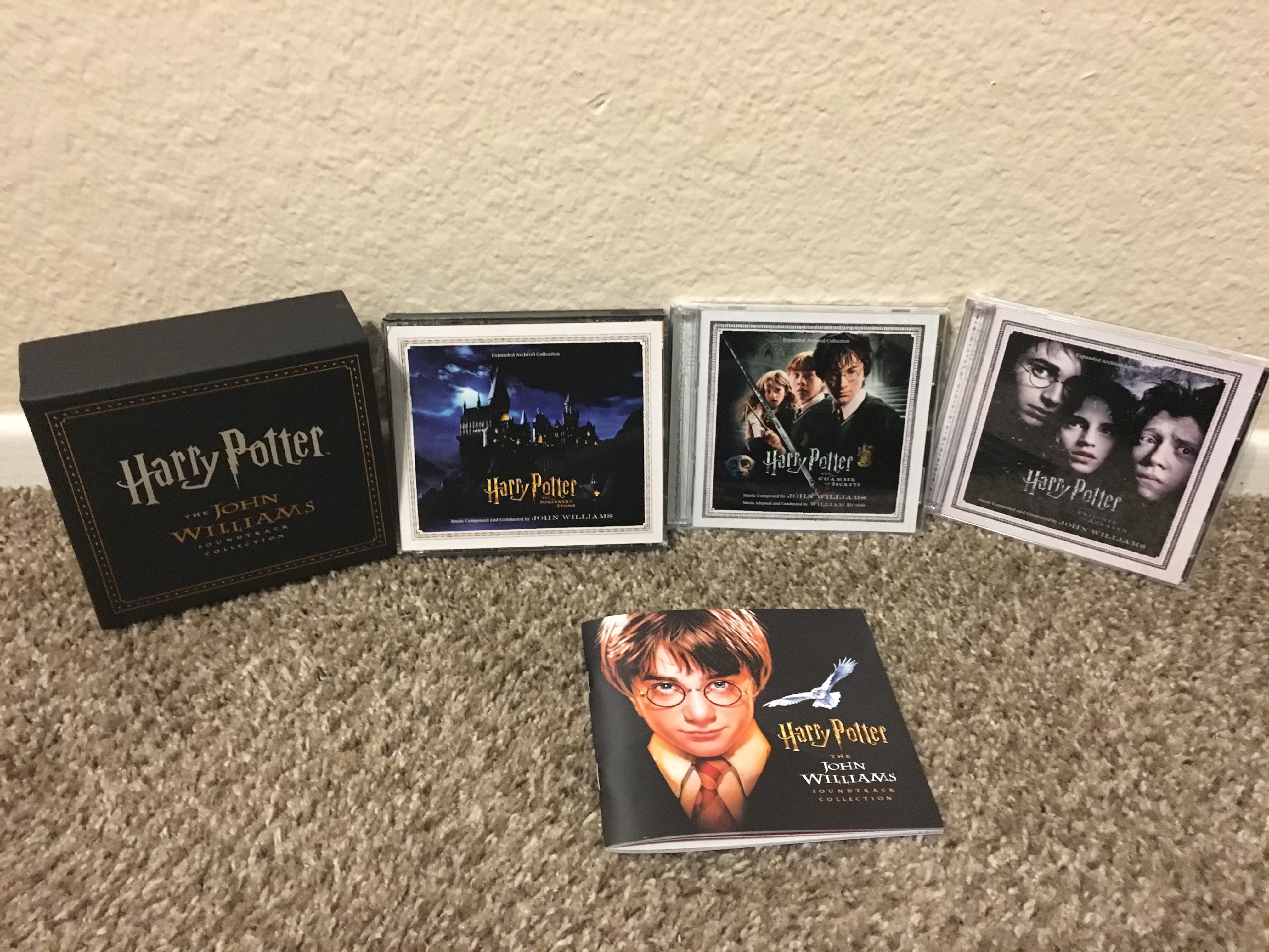 “Harry Potter: The John Williams Soundtrack Collection”, showing the box and all disc cases