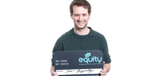 Sean Biggerstaff poses with a giant Equity UK card.