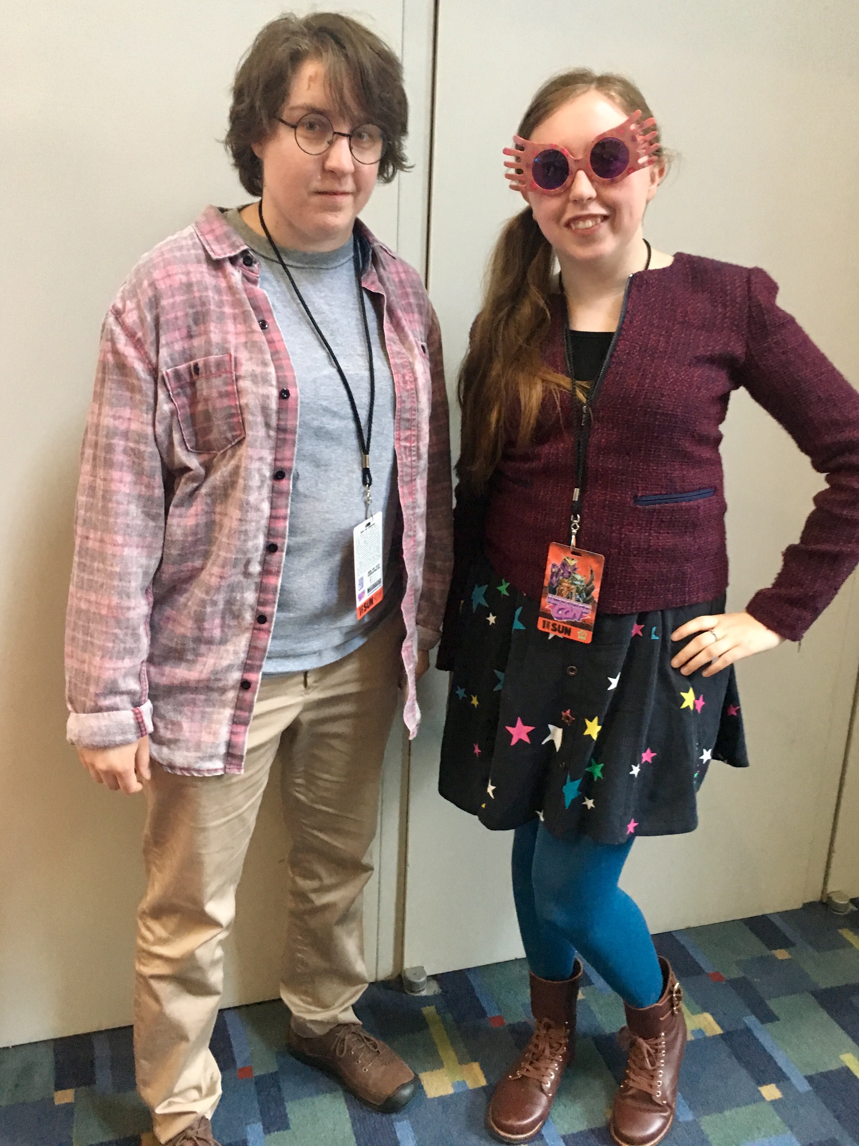A lightning-scarred Harry with Luna Lovegood, who is rocking some amazing Spectrespecs