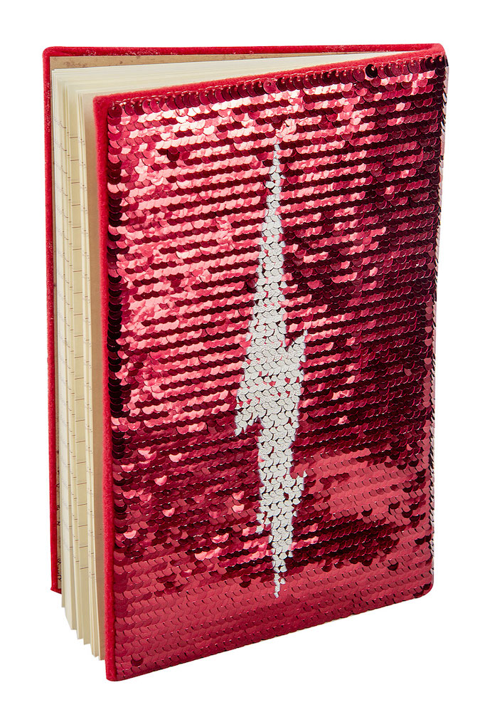 The back cover also has a sequin design, this time featuring a lightning bolt.