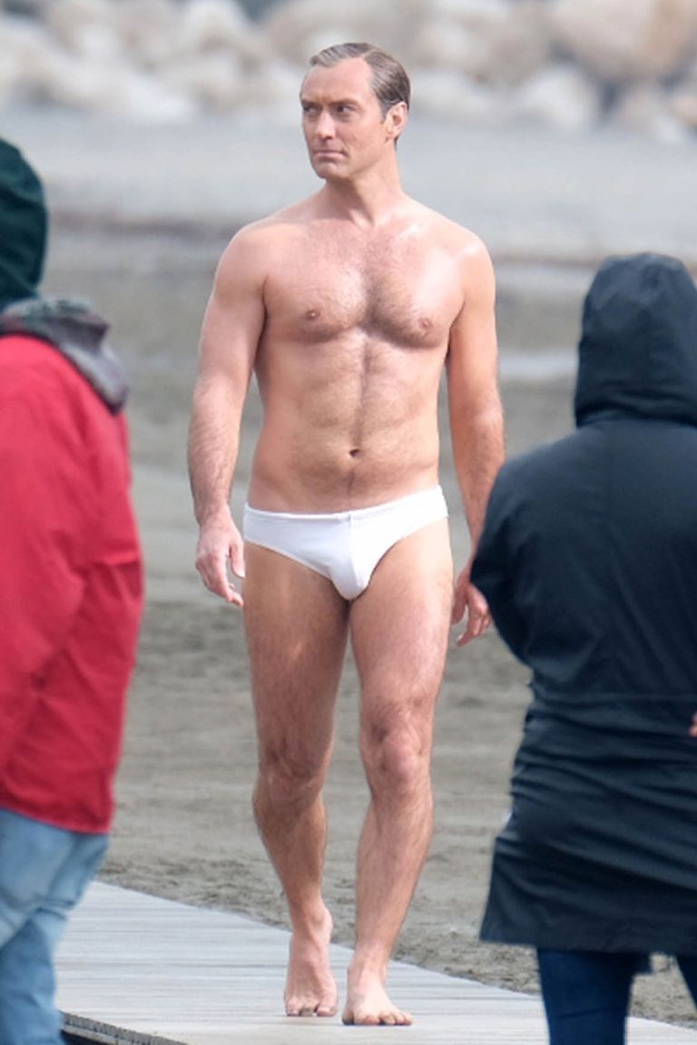 Jude Law walks about in a Speedo while filming “The New Pope” in Venice.