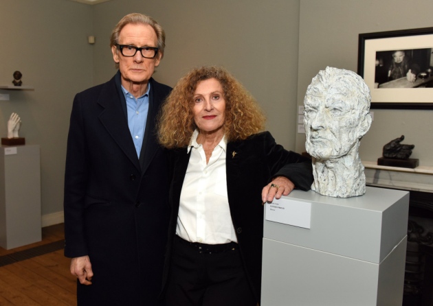 Bill Nighy poses alongside fashion designer and artist Nicole Farhi at the opening of her exhibition.