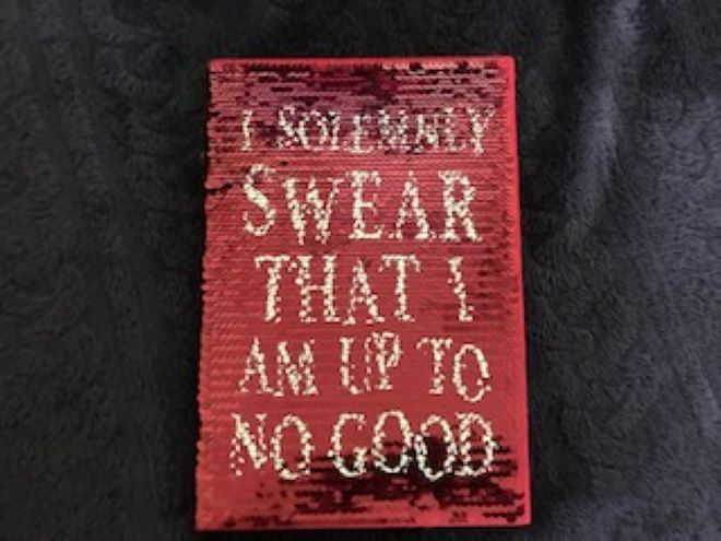 Harry Potter: Manage Your Mischief Marauder’s Map Sequin Notebook from Merchoid, front cover with quote “I solemnly swear that I am up to no good”
