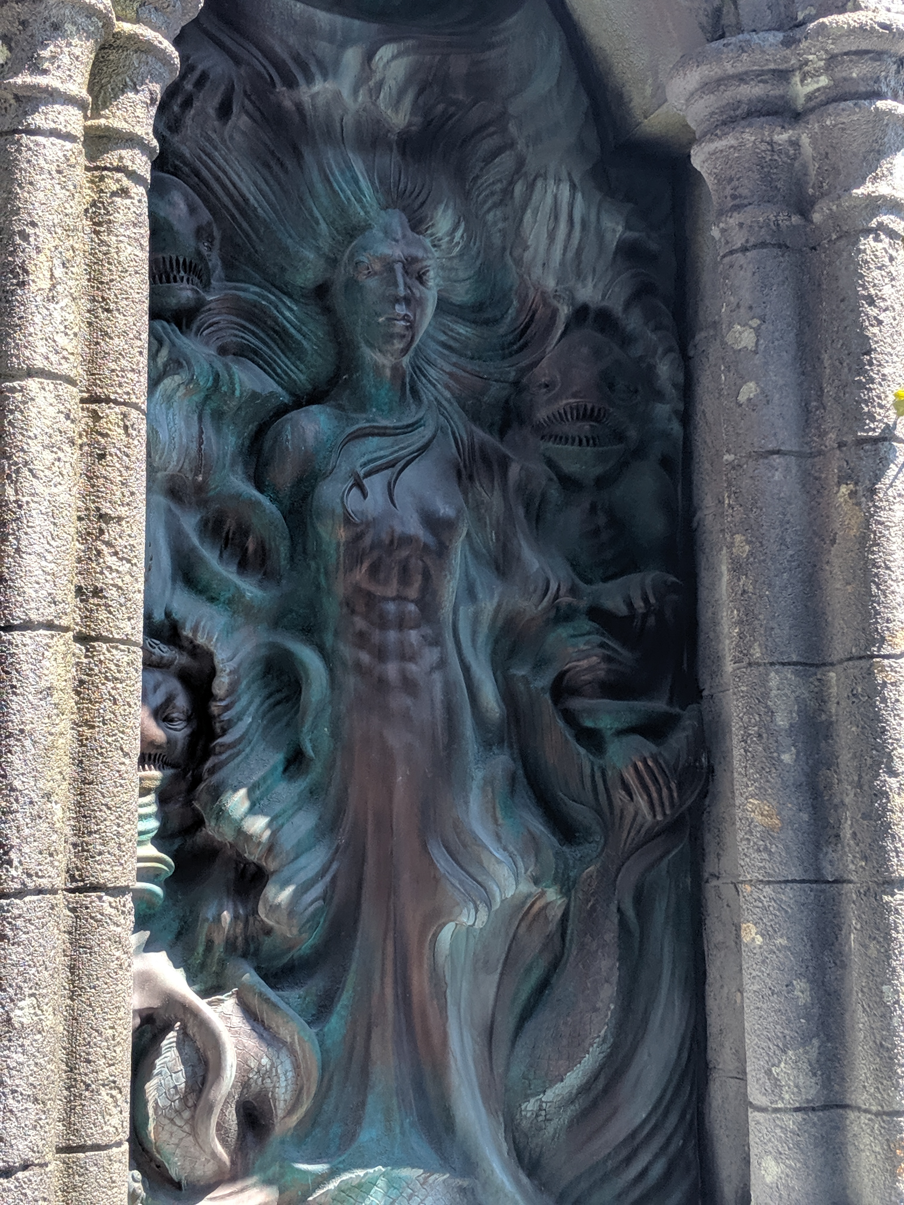 The beautiful image of a merperson greets you before you enter the ruins.