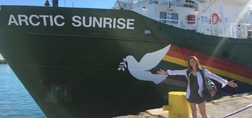 Bonnie Wright is photographed posing in front of the ship Arctic Sunrise.