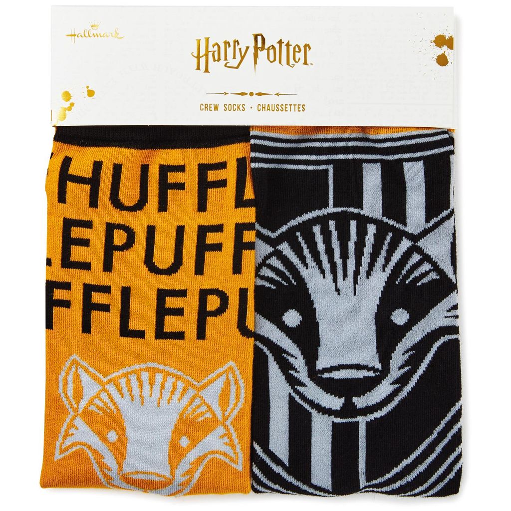 Harry Potter Hufflepuff Crew Socks from Hallmark Gold Crown, close-up showing Hufflepuff House badger