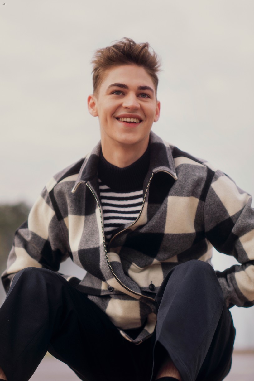 Hero Fiennes-Tiffin looks cheerful in a photo from Woolrich’s autumn lookbook.