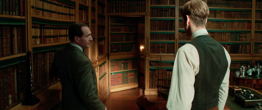 Ralph Fiennes talks with his young protégé in a scene from “The King’s Man”.