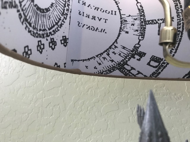 Harry Potter Hogwarts Lamp from The Bradford Exchange: the inside of the fabric lampshade is printed with the Marauder’s Map design in inverse