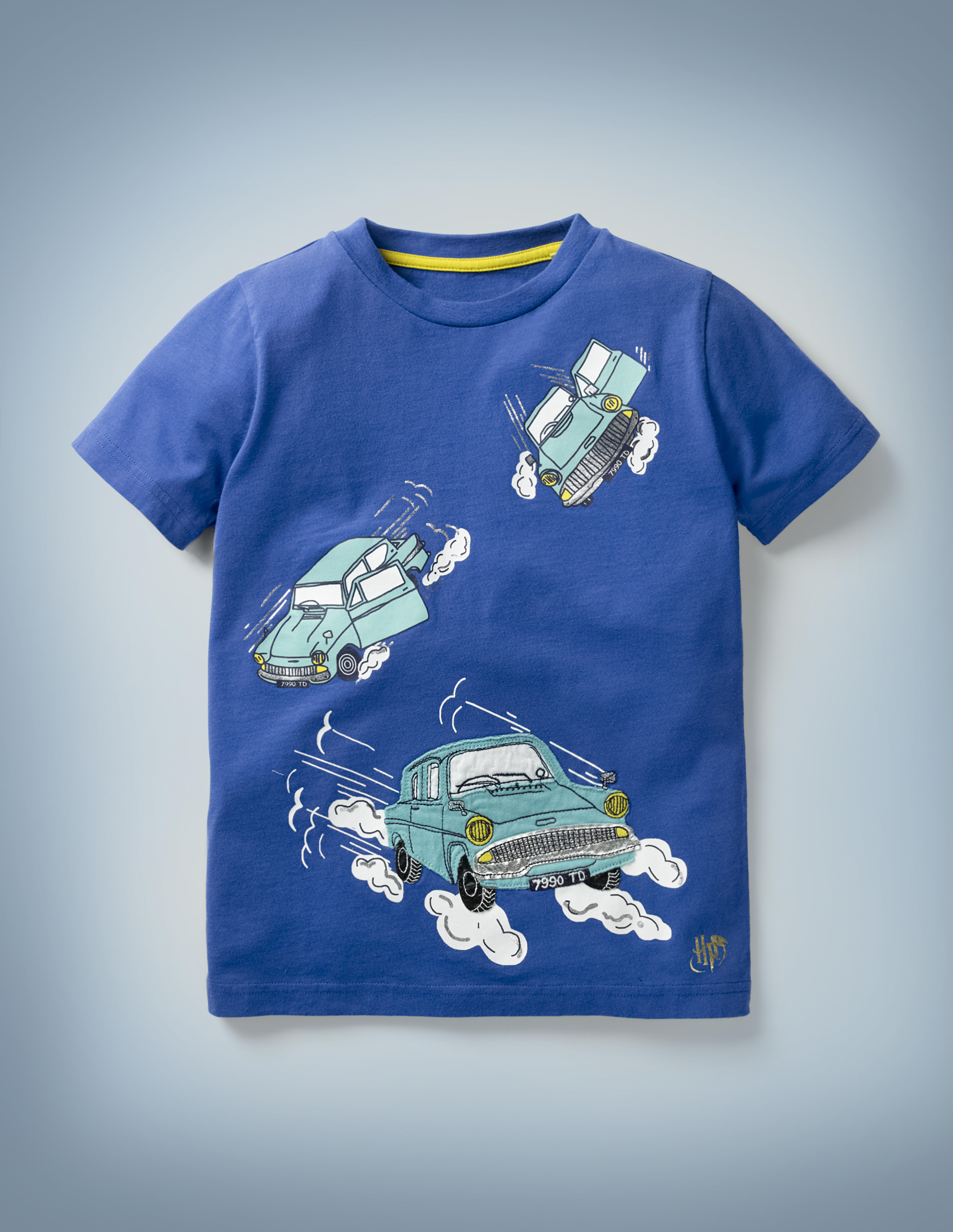 The Mini Boden Magical Transport T-shirt in blue features a fun design that includes three illustrations of Arthur Weasley’s flying Ford Anglia making its way through the sky. It retails at £20.
