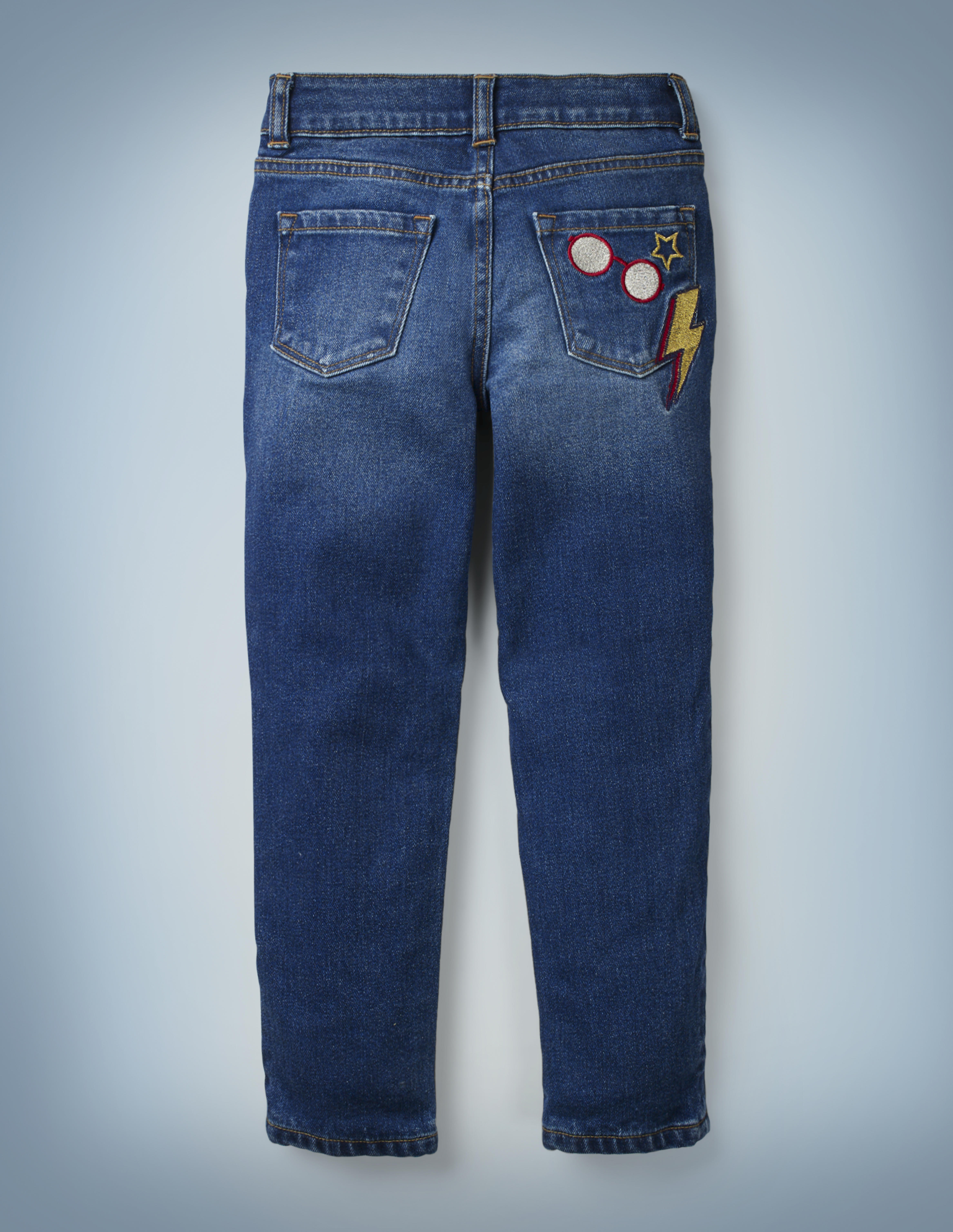 The Mini Boden Lightning Bolt Jeans include a fun design of Harry Potter’s glasses, a red-and-gold lightning bolt, and a star on the back right pocket. They retail for £28.