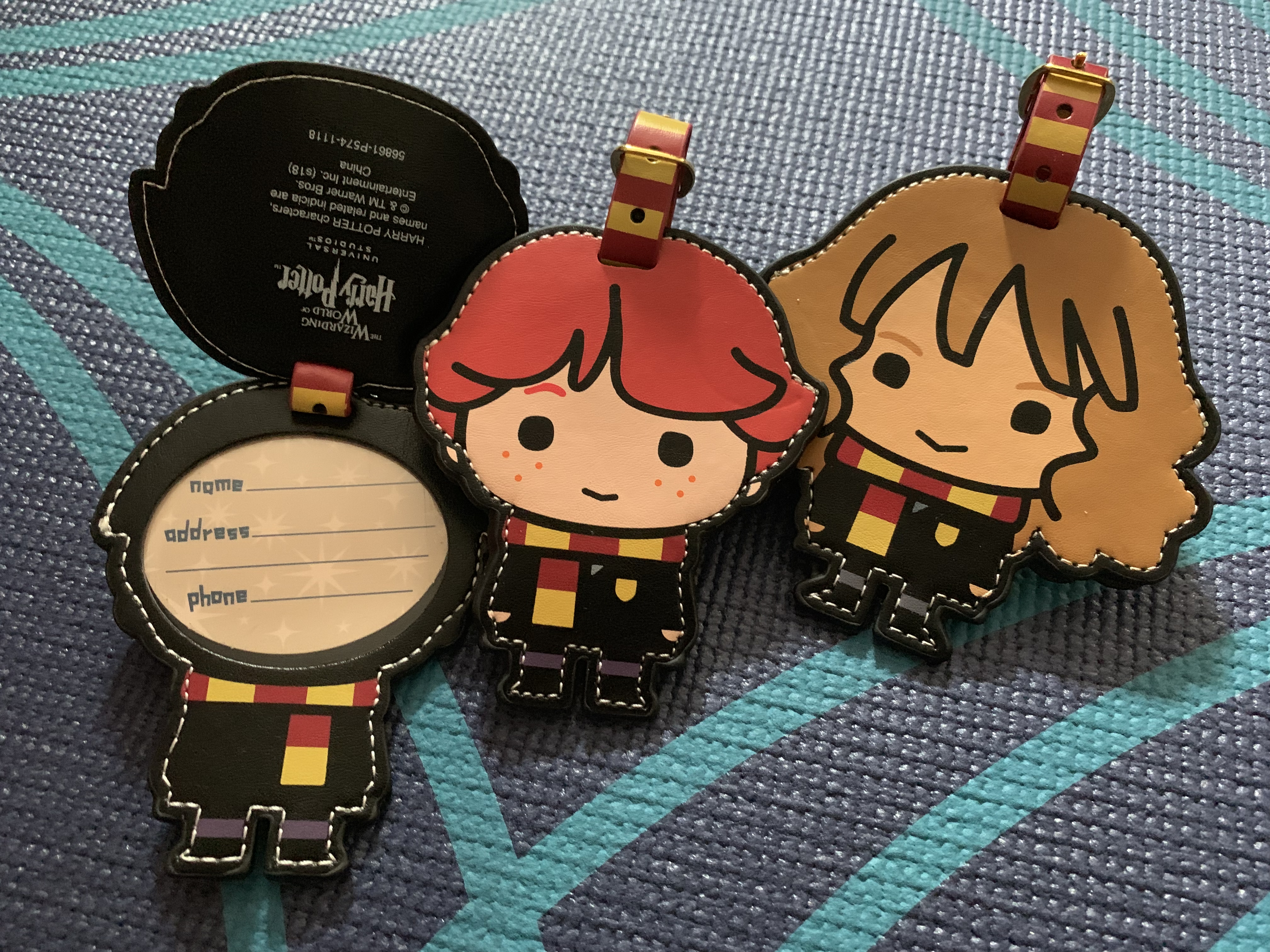 Your “Wizarding World of Harry Potter Exclusive Vacation Package” will include one set of three luggage tags (Harry, Ron, and Hermione). The backs of the tags lift to reveal the owner’s personal information.