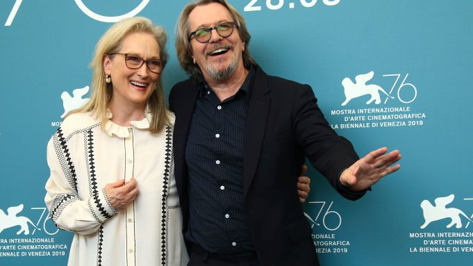 Gary Oldman shares a laugh with “The Laundromat” costar Meryl Streep at the Venice International Film Festival.