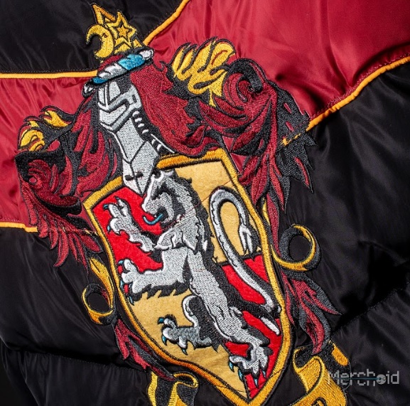 The House crests on the backs and chests of these padded jackets are beautifully embroidered.