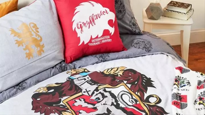 Primark’s new “Harry Potter” bedding collection features sheets, throws, and cushions with Hogwarts House emblems.