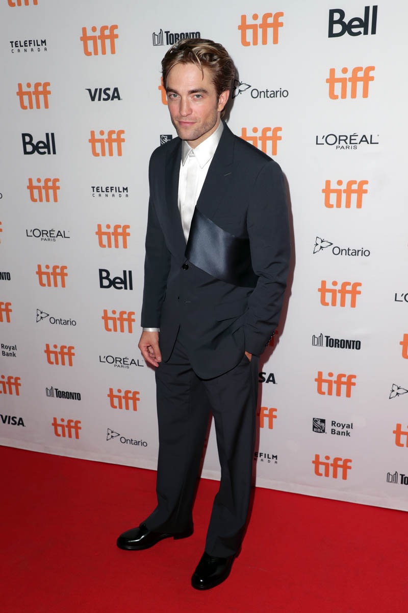 Robert Pattinson poses on the red carpet at the Toronto International Film Festival.
