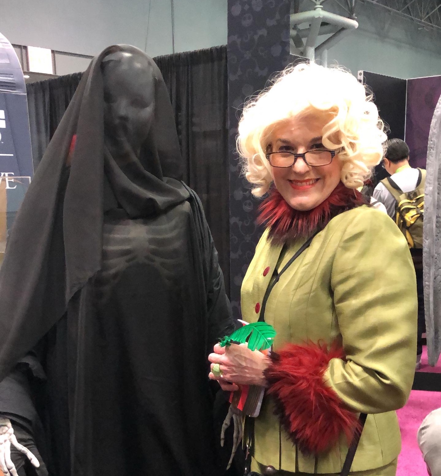 A mother/daughter team cosplaying as Rita Skeeter and a Dementor at New York Comic Con 2019!