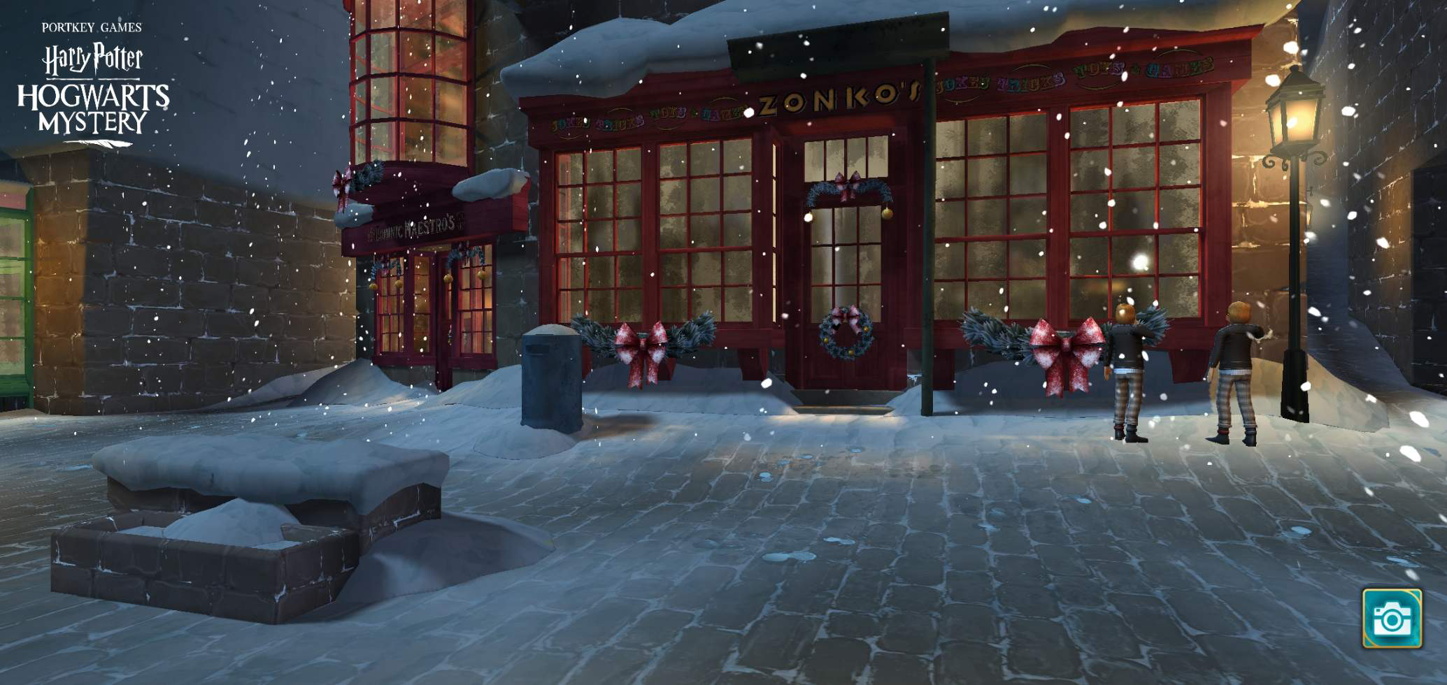 Hogsmeade is now seen by night with glowing windows and holiday decorations.