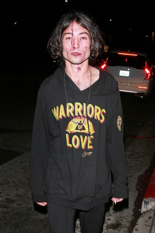 Ezra Miller poses at a Grammys after-party.