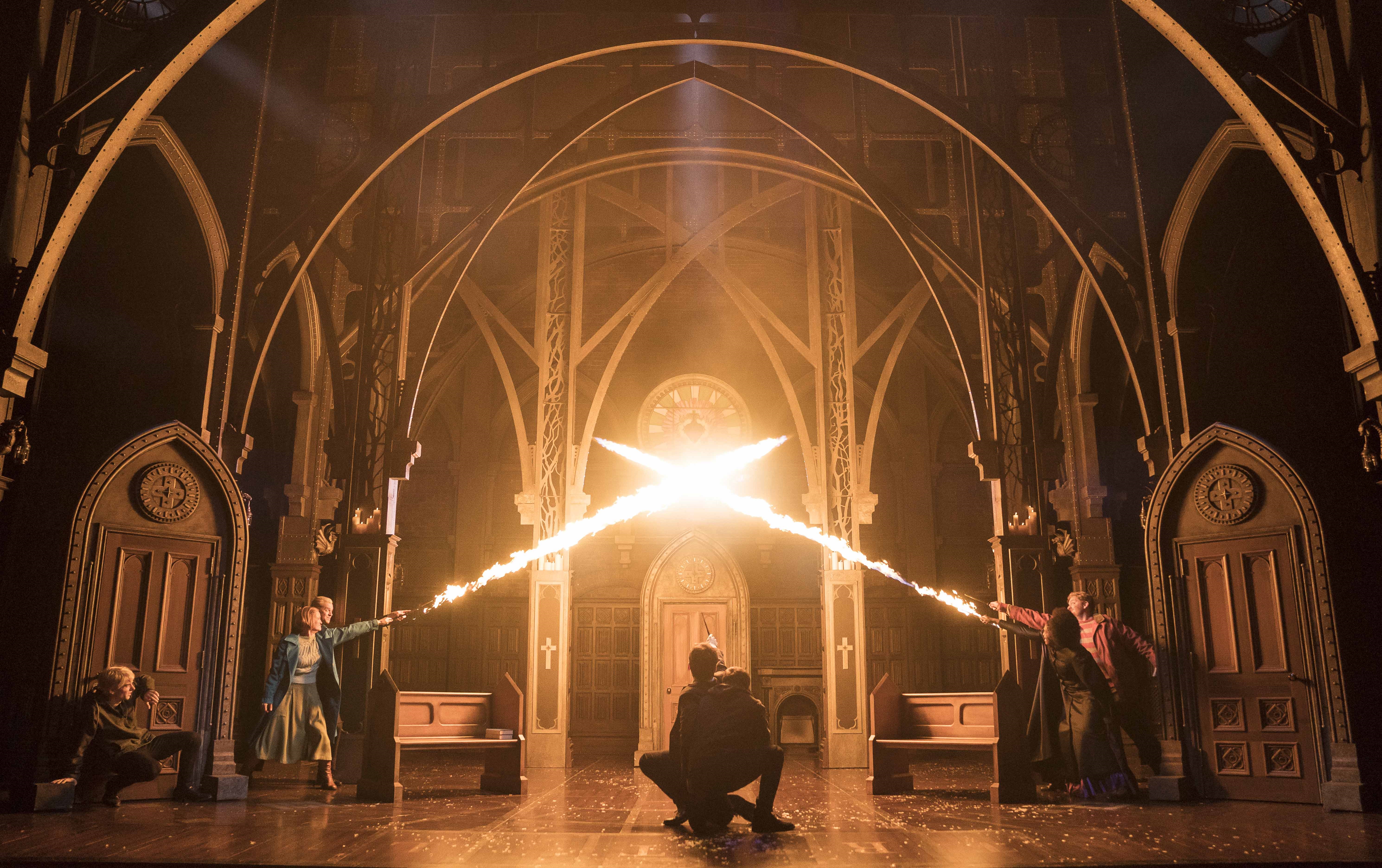 Wands ignite in a scene from "Harry Potter and the Cursed Child" San Francisco.